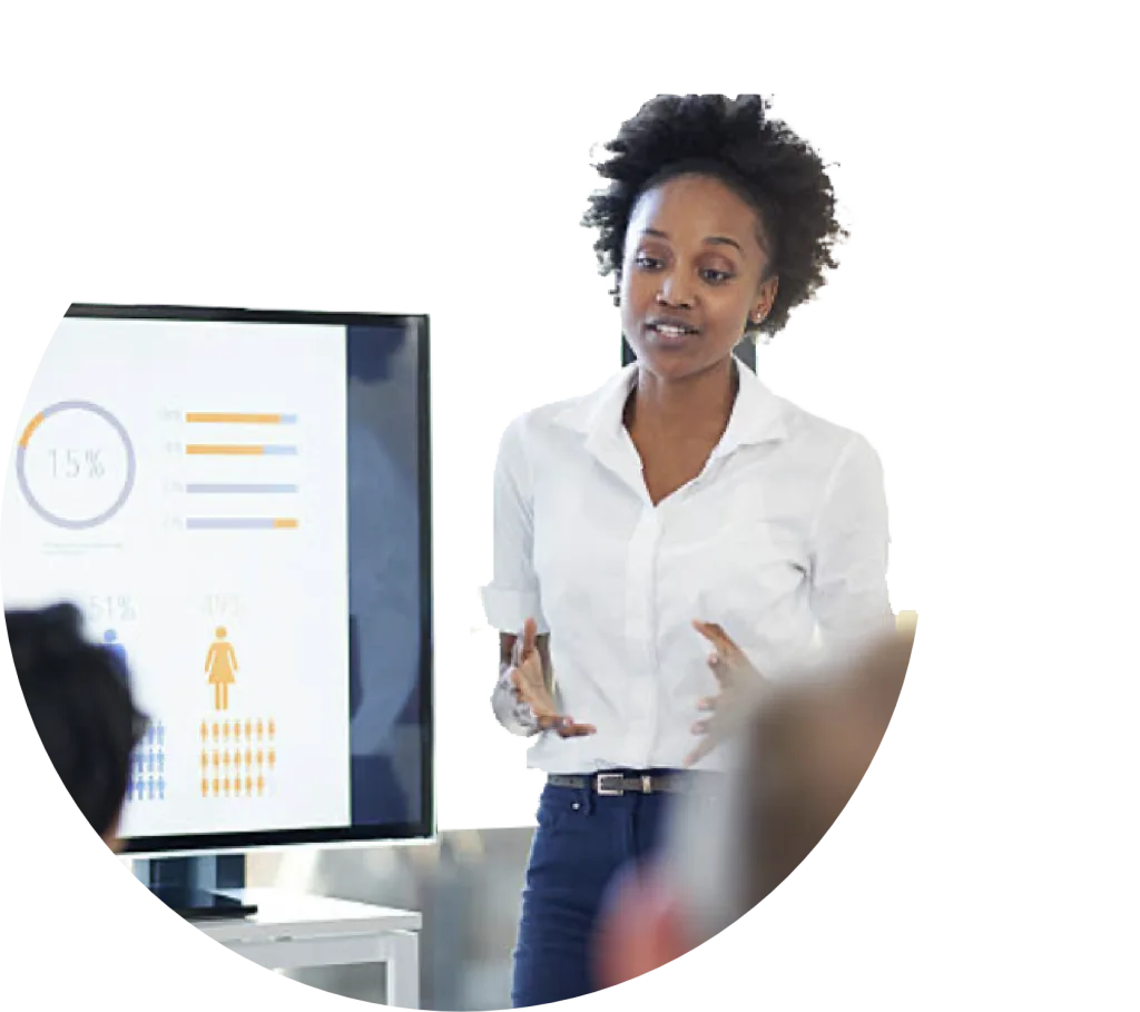 woman giving a presentation with screen behind her