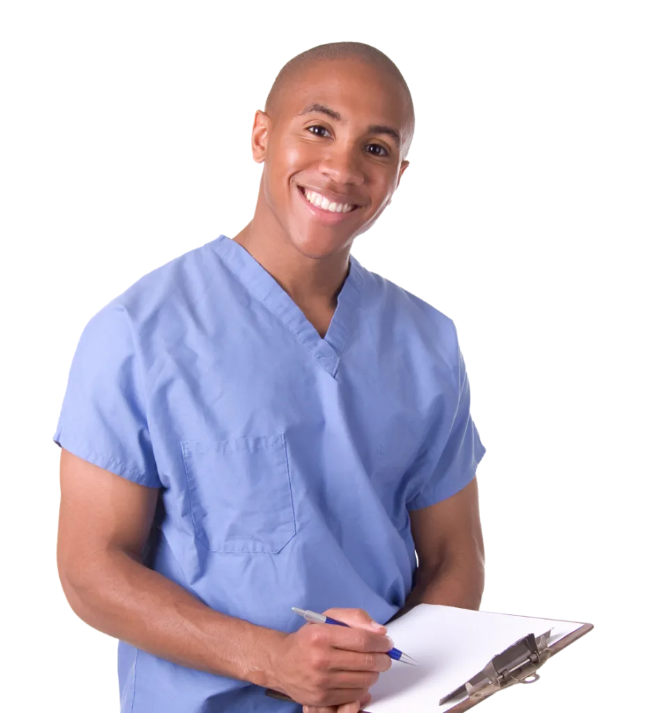 male nurse smiling while doing paperwork